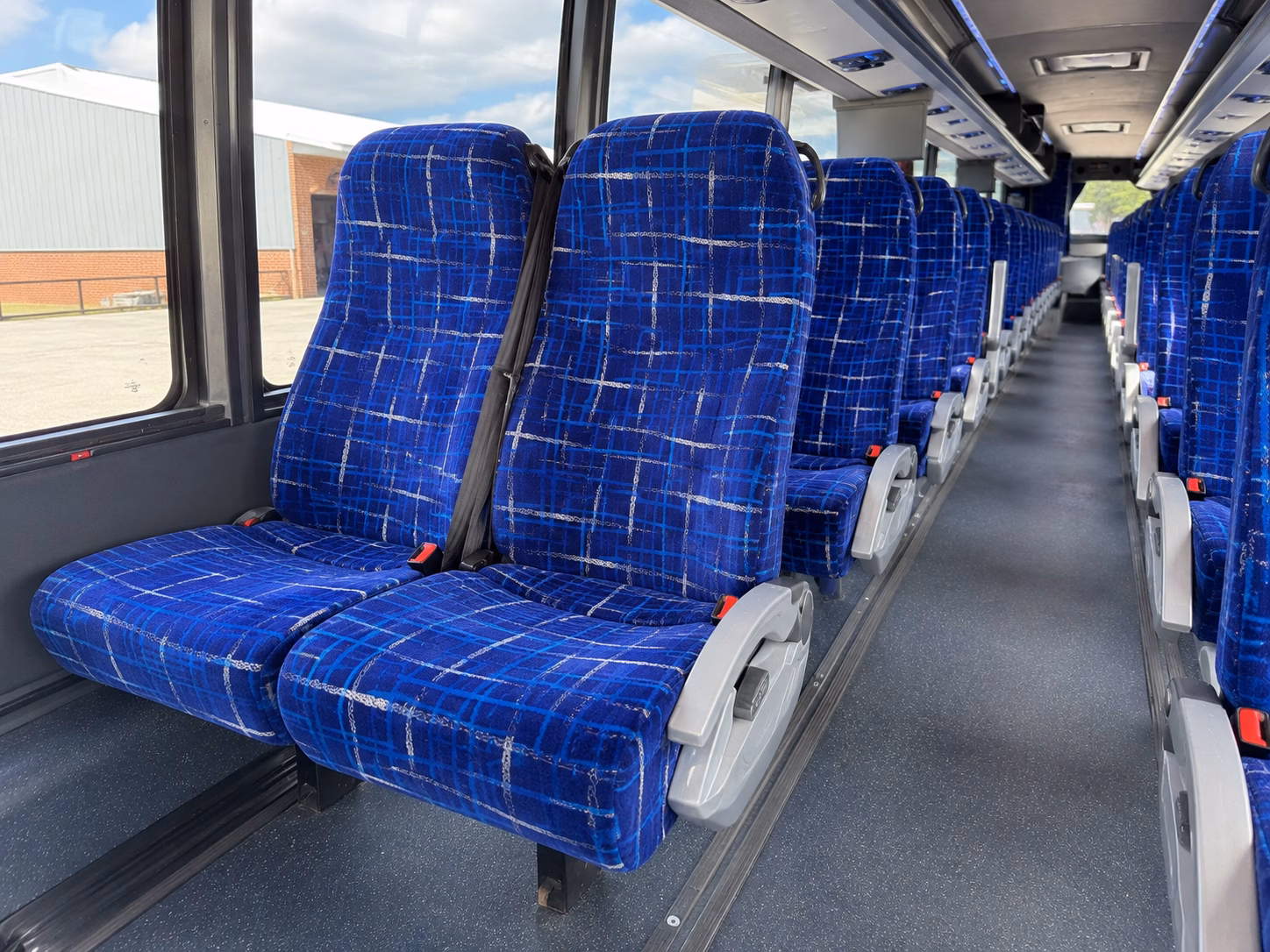 how starting location and deadhead affect charter bus rates in southfield
